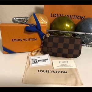 Authentic Louis Vuitton key cles/card holder NIB